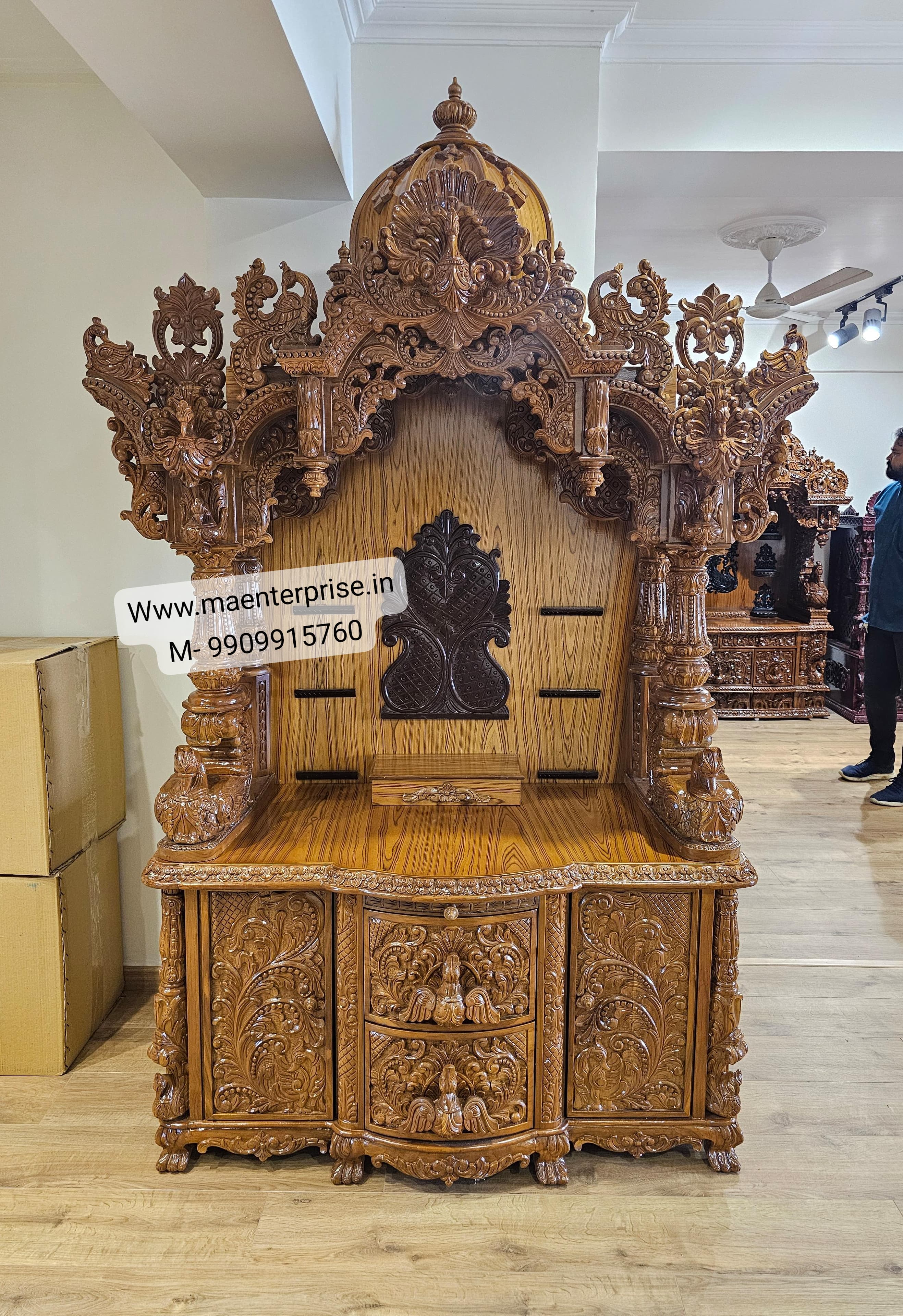 home temple Premium carved teakwood Hindu temple for sale, ornate floral detailing and shikhara design, high-quality pooja mandir ideal for export to USA and UK homes.