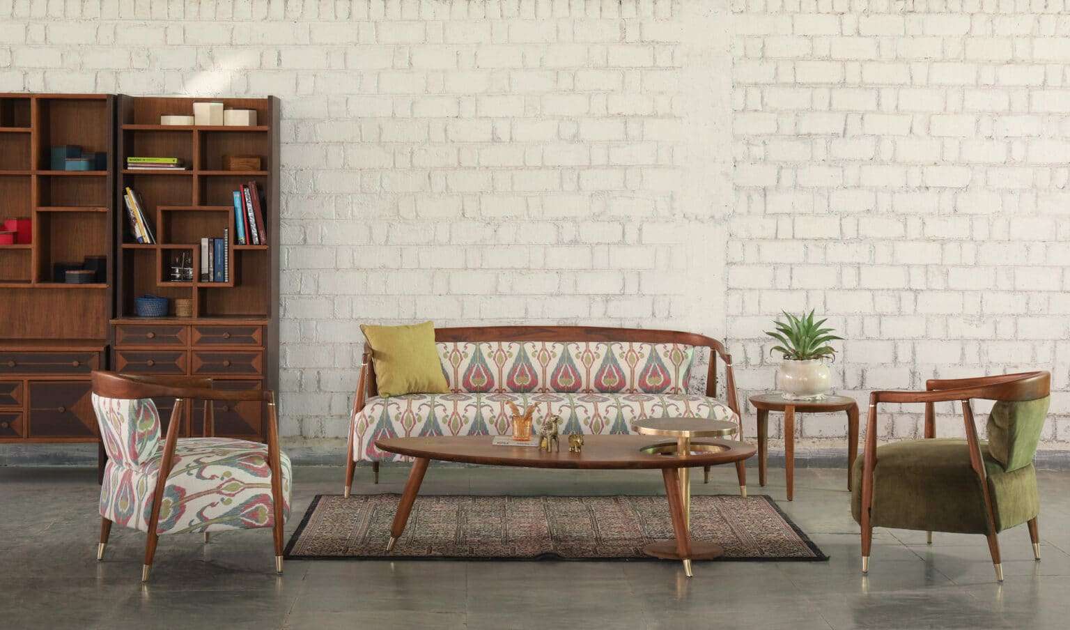 Modern curved teakwood sofa with blue upholstery and printed back cushions, export-quality seating for USA and UK buyers.